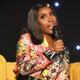 Jackie Aina speaks onstage during the 2019 ESSENCE Beauty Carnival on April 28, 2019 in New York City.